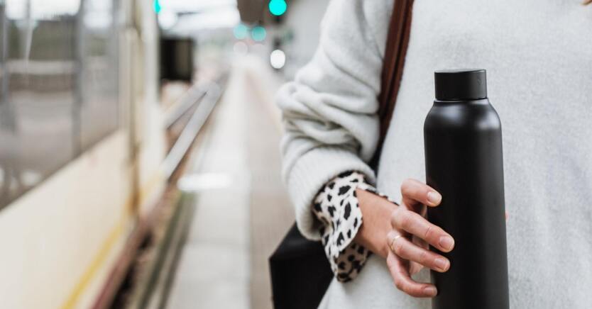 Women holding water bottle