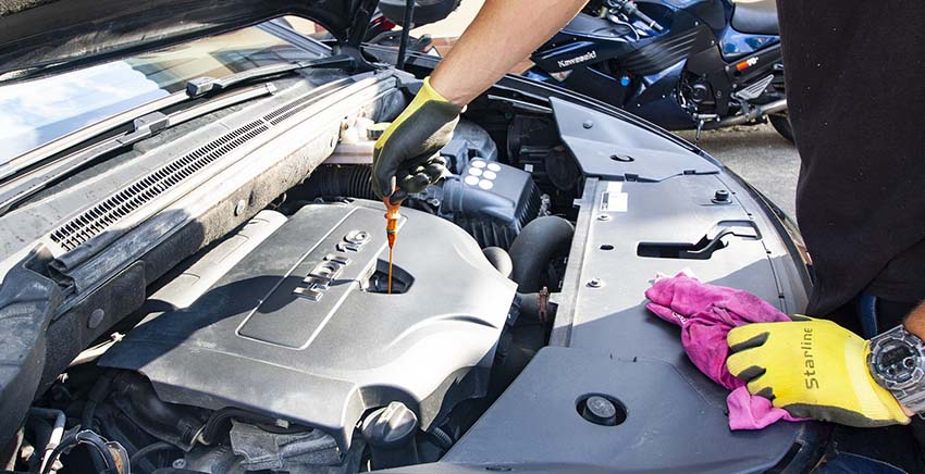 person fixing engine