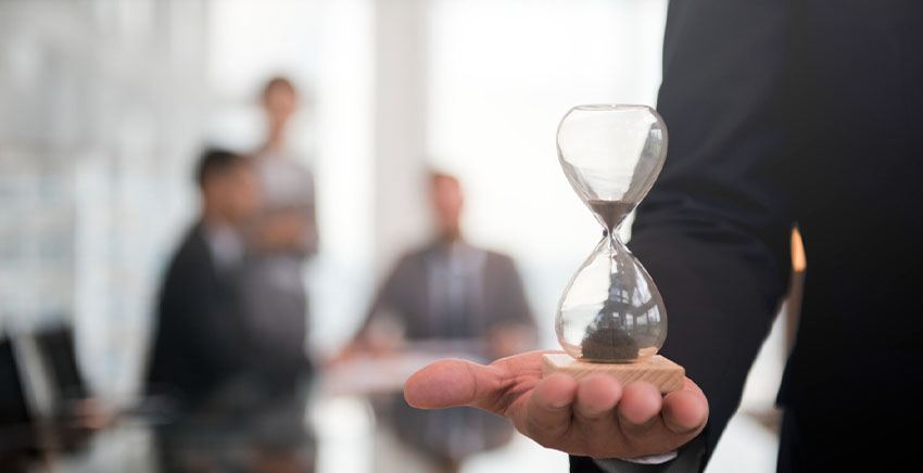 person holding hourglass